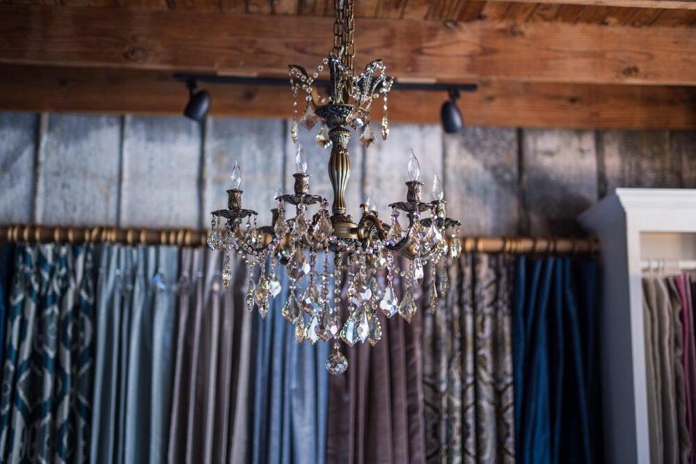 Crystal chandelier and drapery detail